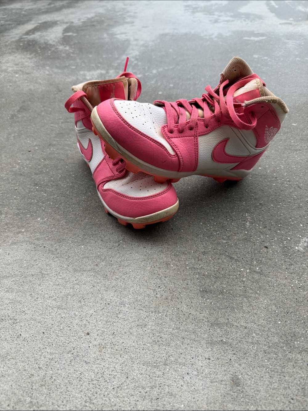 Nike adult Pink and White High-Top Athletic Cleats